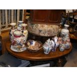 A quantity of Oriental vases and ginger jars etc