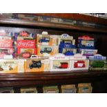 A selection of boxed die cast vans