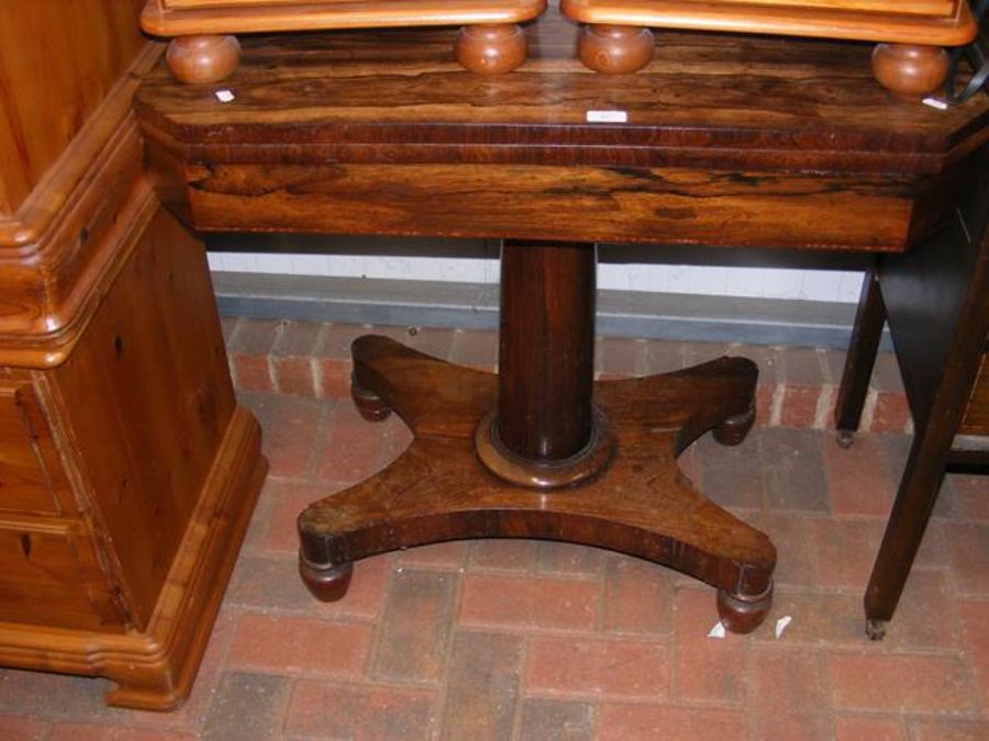 A mid 19th century rosewood fold-over card table o