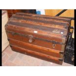 A dome top travelling trunk