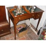 An Edwardian writing desk with two drawers to the