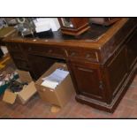 A Victorian oak Partner's desk with drawers and cu