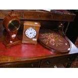 A Syril Tucker inlaid balloon mantle clock togethe