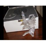 A boxed Swarovski crystal eagle ornament