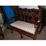An antique style child's/dolls two seater settee