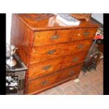 A Victorian scumbled pine chest of drawers