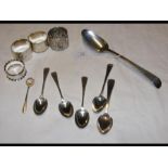 Silver spoons, napkin rings