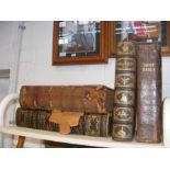 Three vintage Bibles, together with Fox's 'The Book of