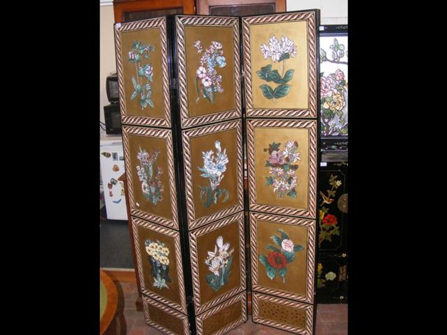 An oriental three-fold screen