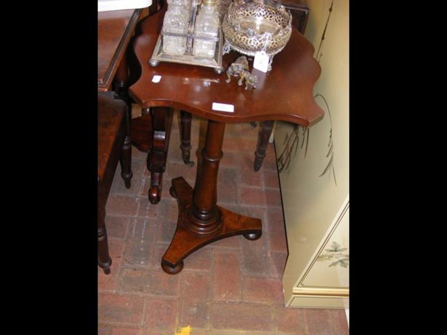 A mahogany wine table