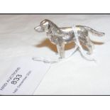 A small silver dog ornament