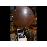A 70cm diameter Georgian mahogany snap-top tripod