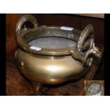 An Oriental brass censer with lozenge mark to base