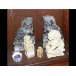 A pair of carved soapstone Dogs of Fo, etc.