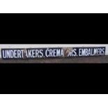 An enamel sign, Undertakers, Cremators, Embalmers