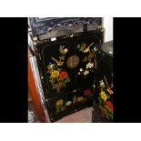 An oriental black lacquered cabinet - 102cm high