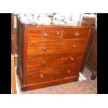 A Victorian cap top mahogany chest of drawers