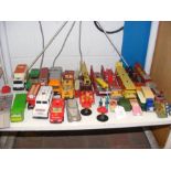 A collection of die cast vehicles, including Corgi