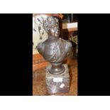 A 34cm high bronze bust on marble plinth