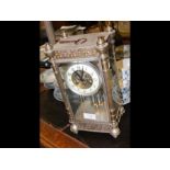 A four glass striking mantel clock - 33cm high - w