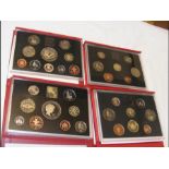 A Royal Mint 1986 coin set together with three oth