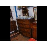 A 19th century mahogany bow fronted chest of two s