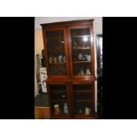 A Victorian mahogany bookcase with glazed upper se