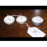 A silver cased pocket watch and two others