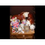 A medley of Butcher's shop advertising collectables comprising two 'Best of British' pigs and two ce