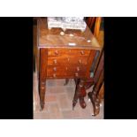 A Victorian mahogany work table with three drawers