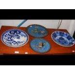 An antique blue and white charger, Cloisonne plate
