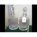 A pair of antique cut glass decanters with stopper