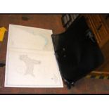 A picture carrying case containing various maritim