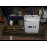 Vintage milk churns together with fire fender, bre