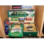 A variety of boxed die cast vehicles, including so