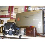 Various photographic equipment, including a Sony V
