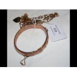 A gold bangle, bracelet etc