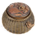A JAPANESE MEIJI PERIOD NOVELTY INKWELL modelled as a basket of fish with a woven brass basket and