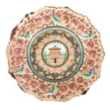 A 19TH CENTURY ISLAMIC ENAMEL PLATE finely decorated with a reliefwork border decorated with birds