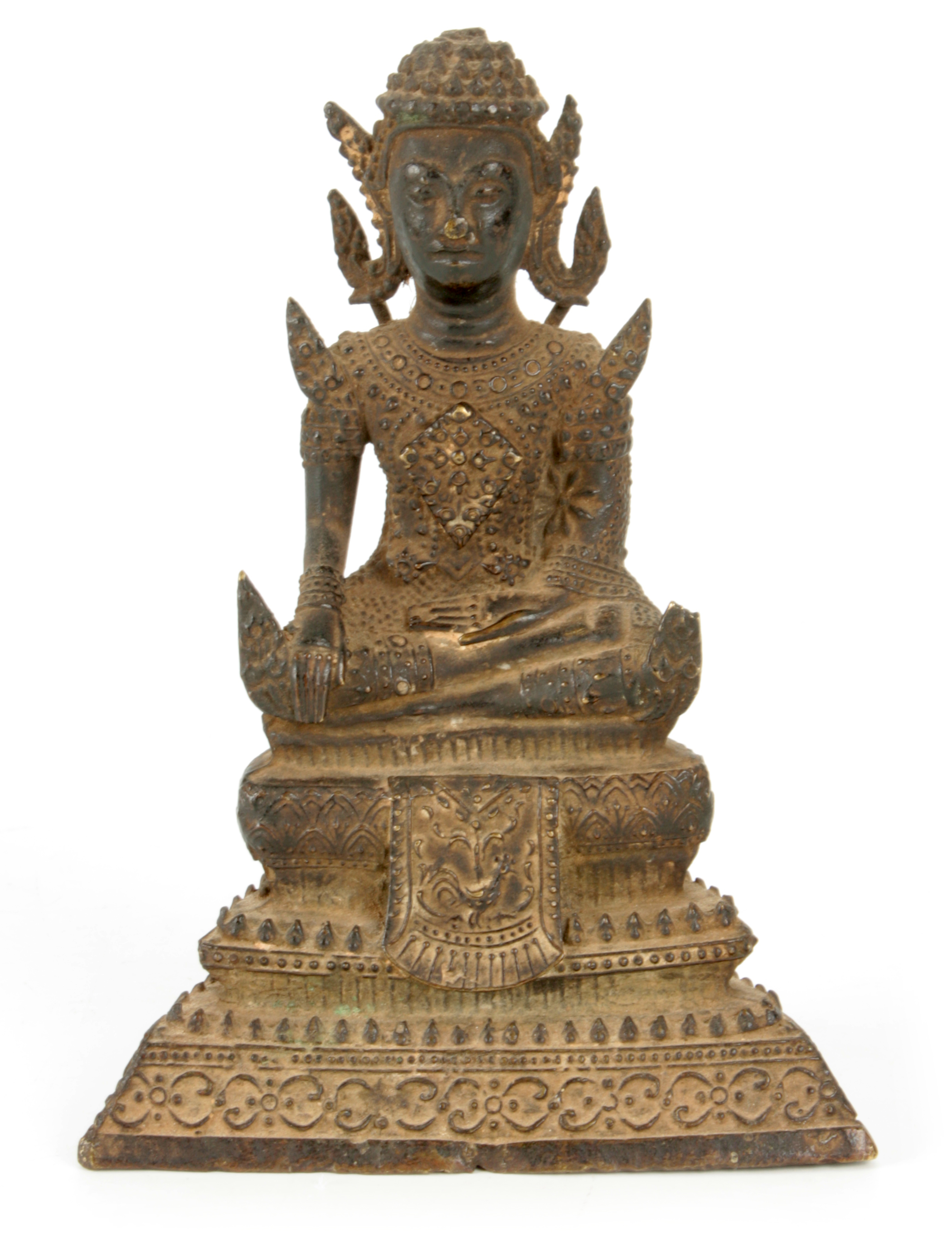 A TIBETAN BRONZE SEATED BUDDHA 14cm high.