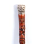 A LARGE 19TH CENTURY CARVED MALACCA CHINESE WALKING STICK with carved shaft depicting animals and