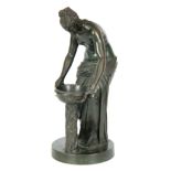 A 19TH CENTURY GREEN PATINATED GREEK STYLE FIGURAL BRONZE SCULPTURE depicting a half-nude female