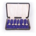 A SET OF SIX EDWARD VII GOTHIC STYLE CAST SILVER COFFEE SPOONS with Galleon topped figural stems and