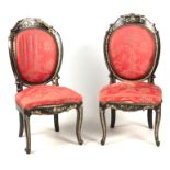 A PAIR OF VICTORIAN EBONISED INLAID SIDE CHAIRS with mother of pearl inlays decorated with