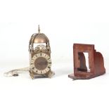 S KNAPP, LINCOLN A 20TH CENTURY LANTERN CLOCK of typical form with brass bell straps supporting a