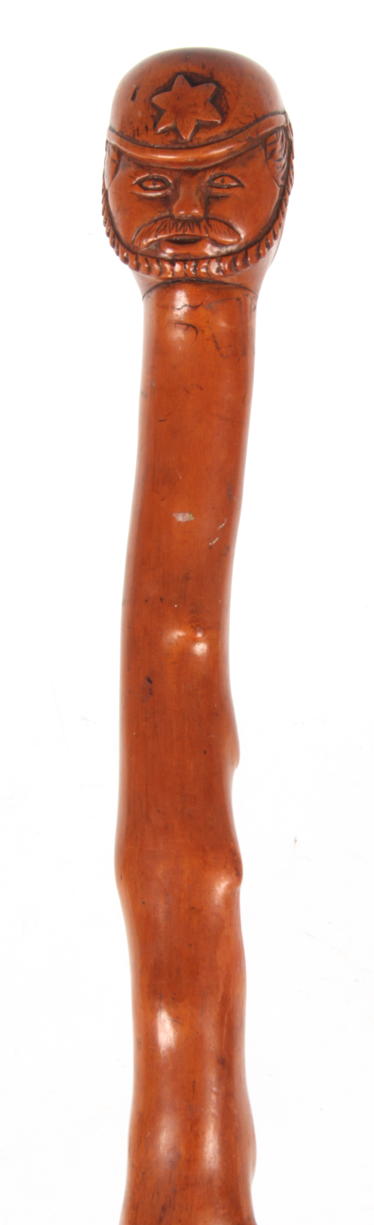 A 19TH CENTURY FOLK ART CARVED HAWTHORN WALKING STICK depicitig a soldier 92cm overall.