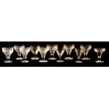 A SET OF ELEVEN 19TH CENTURY ETCHED WINE GLASSES / RUMMERS decorated with grapes and vines 14cm high