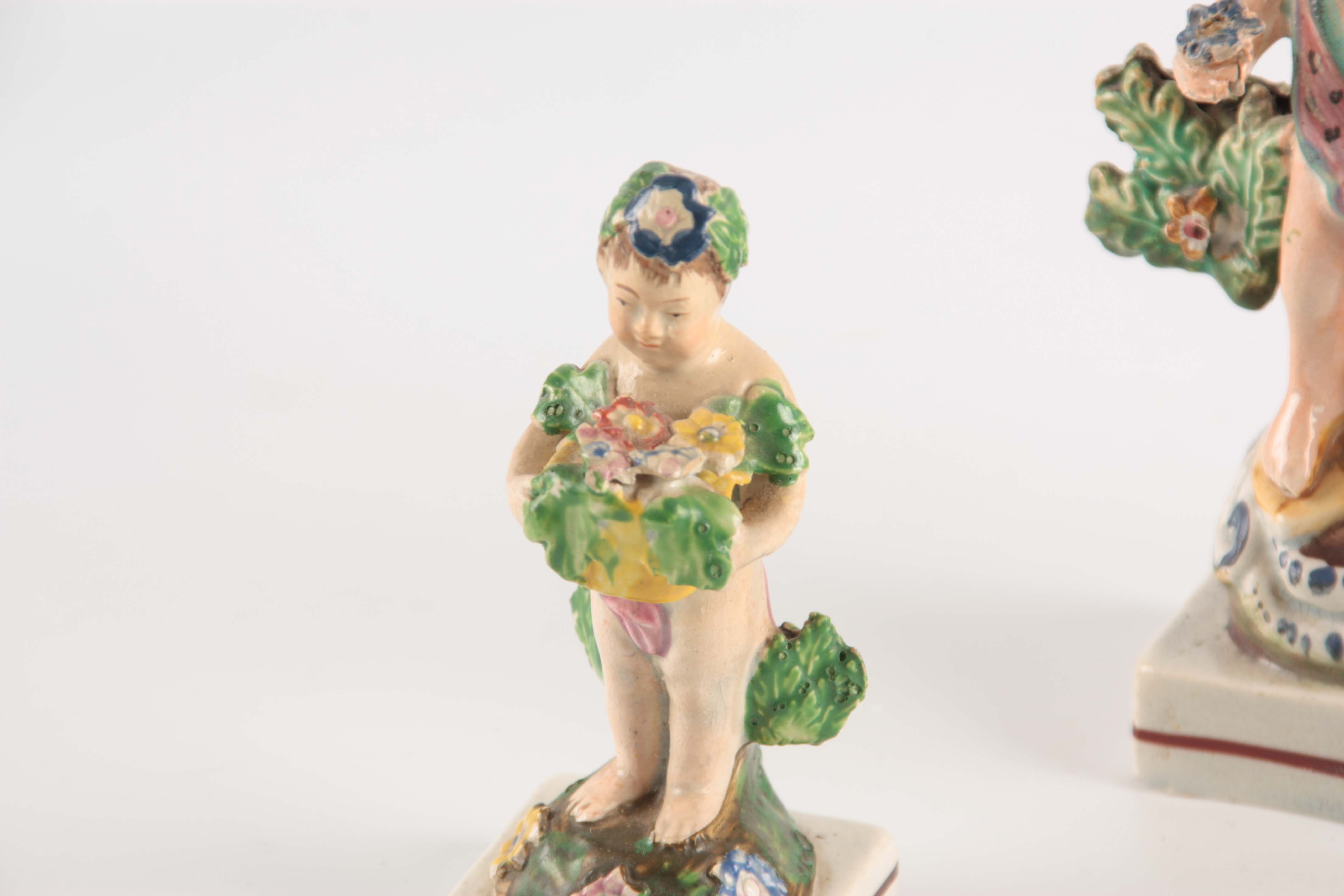 A SELECTION OF FOUR EARLY 19TH CENTURY STAFFORDSHIRE PEARLWARE FIGURES of cherubs holding various - Image 3 of 5