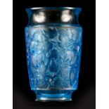 R LALIQUE, A BLUE STAINED ‘DEAUVILLE’ GLASS VASE of tapering dorm having concave top and bottom rim,