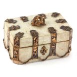 AN UNUSUAL 19TH CENTURY CONTINENTAL MOTHER OF PEARL VENEERED CASKET with engraved brass and enamel